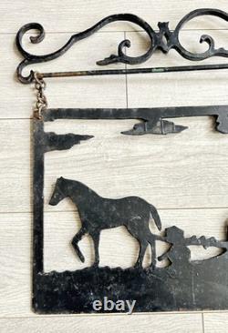 Antique enseigne en fer forgé figurant un laboureur