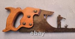 Art populaire ancien. Scie à lame sculptée figurant une scéne de chasse