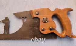 Art populaire ancien. Scie à lame sculptée figurant une scéne de chasse