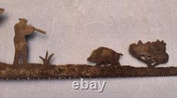 Art populaire ancien. Scie à lame sculptée figurant une scéne de chasse