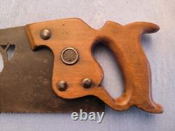 Art populaire ancien. Scie à lame sculptée figurant une scéne de chasse