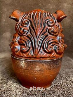 Bouteille en céramique, couvercle en tête de chien de Fô. Chine, 19ème