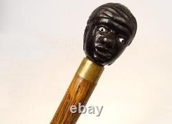 Canne ancienne pommeau bois noirci sculpté tête homme noir XIXème siècle