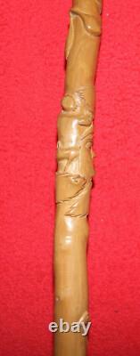 Canne de marche bois sculpté personnages animaux flore XIX/XXème Pélerin