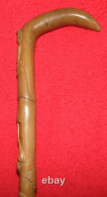 Canne de marche bois sculpté personnages animaux flore XIX/XXème Pélerin