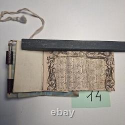 Carnet de 1840 avec calendrier + un porte monnaie gravé à l'initial LOT 14