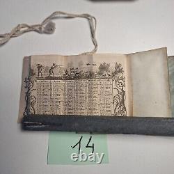 Carnet de 1840 avec calendrier + un porte monnaie gravé à l'initial LOT 14