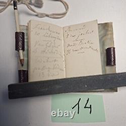 Carnet de 1840 avec calendrier + un porte monnaie gravé à l'initial LOT 14