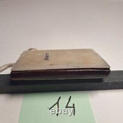 Carnet de 1840 avec calendrier + un porte monnaie gravé à l'initial LOT 14