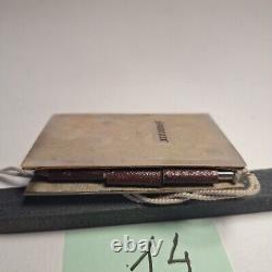 Carnet de 1840 avec calendrier + un porte monnaie gravé à l'initial LOT 14