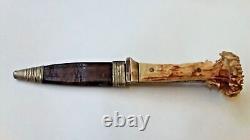 Couteau de chasse dit de bottes lame fixe