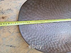 Porte buche en cuivre, et pieds de lions. Poignée en céramique