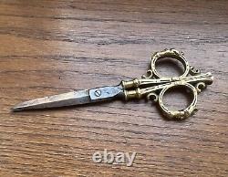Rare Ancienne paire de ciseaux vers 1850 Visage Barbu acier et bronze