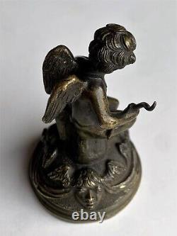 Rare sonnette de table en bronze au cupidon cloche