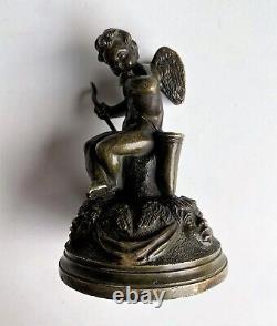 Rare sonnette de table en bronze au cupidon cloche