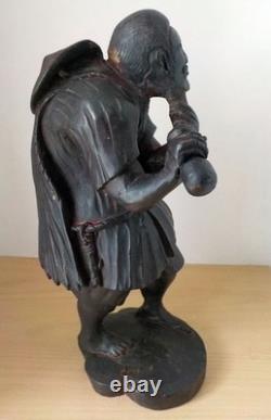 Statuette en bois de pèlerin d'Asie Chine